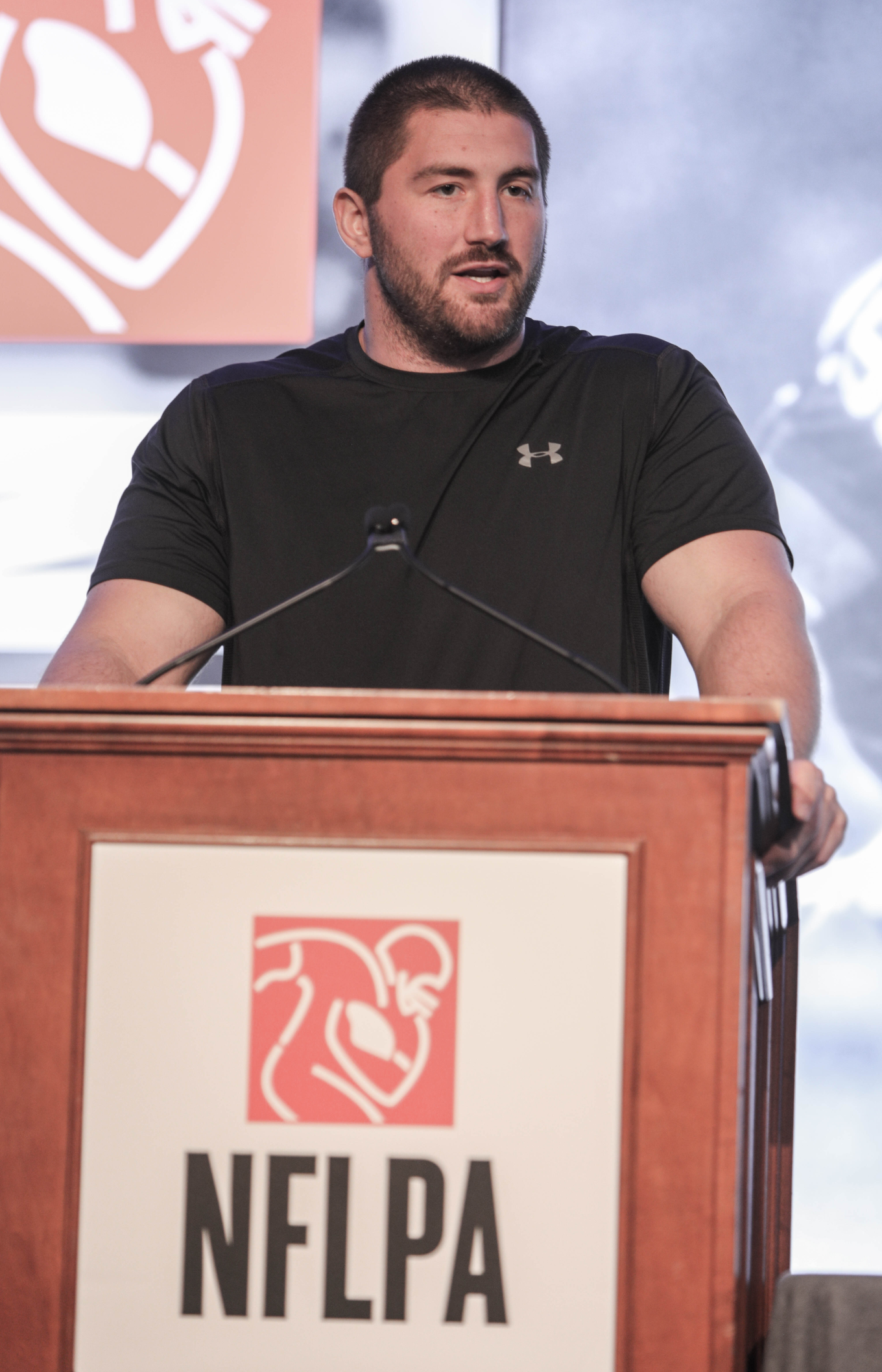 JC Tretter giving a speech as the NFLPA president. 