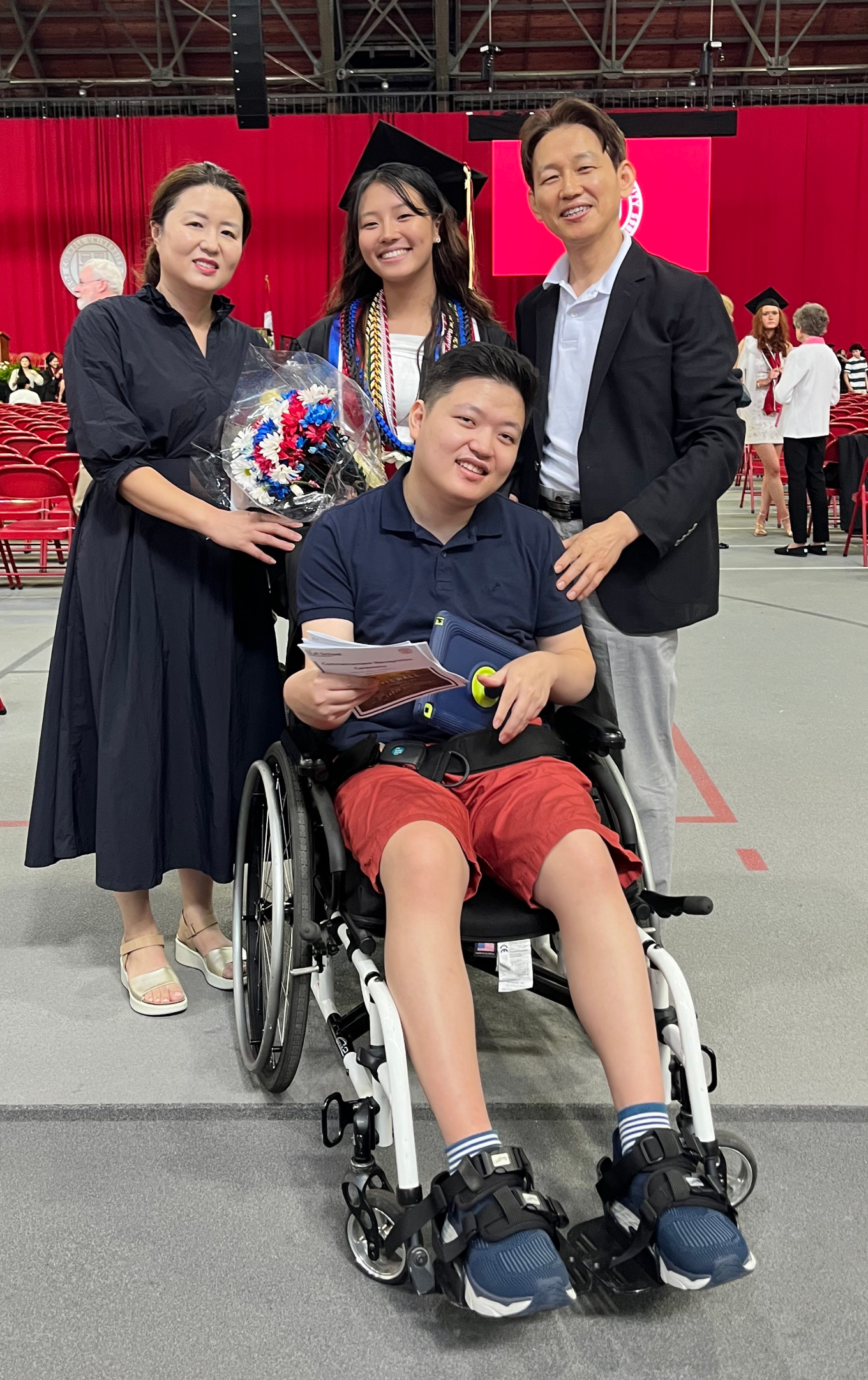 Grace Kwon '24 with her family at graduation.