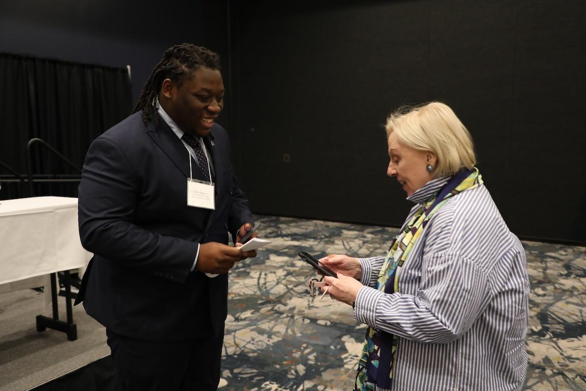 Victor Edwards and Martha Jackson, speaking with eachother