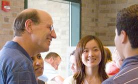 Dean Katz enjoys an ice cream social with students.