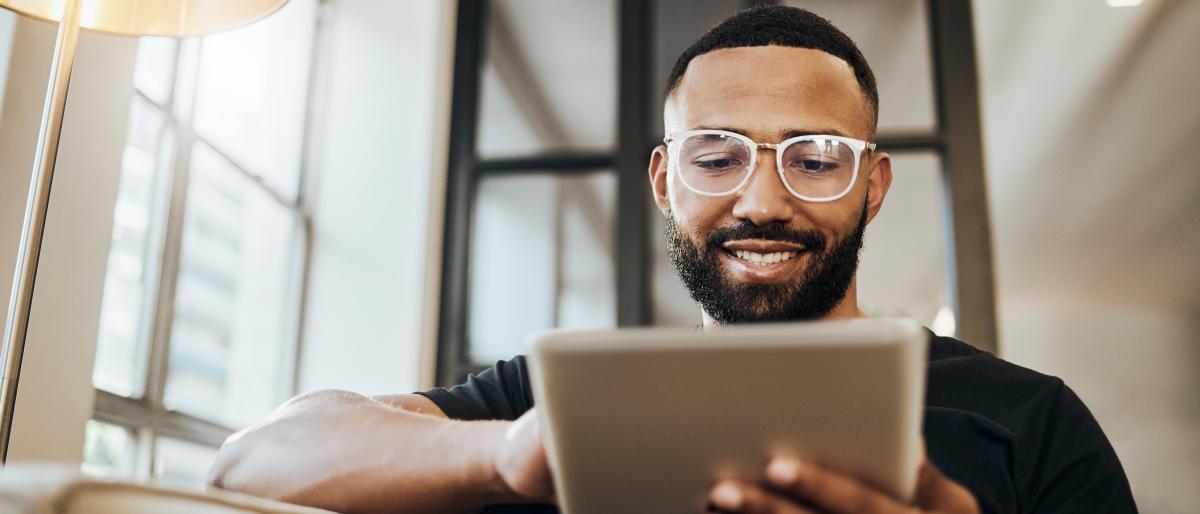 Man reading tablet