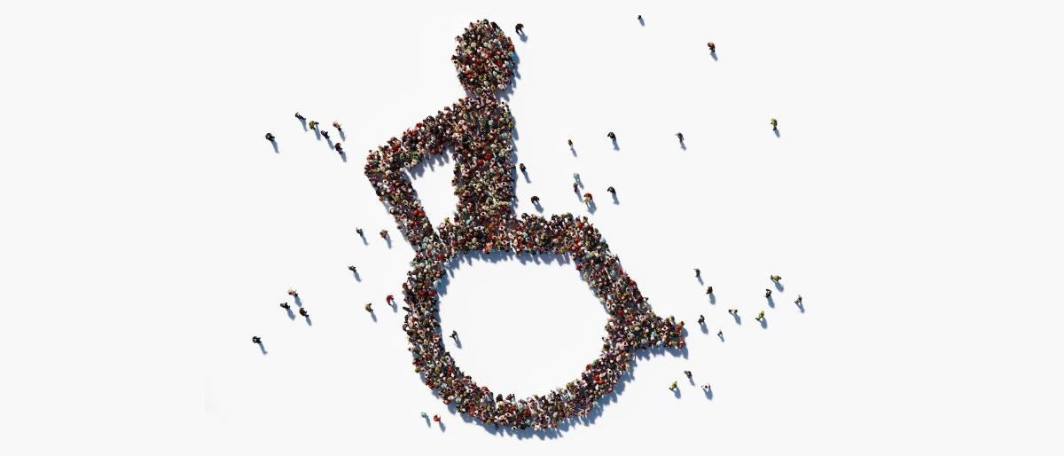 overhead view of crowd standing in shape of International Symbol of Access