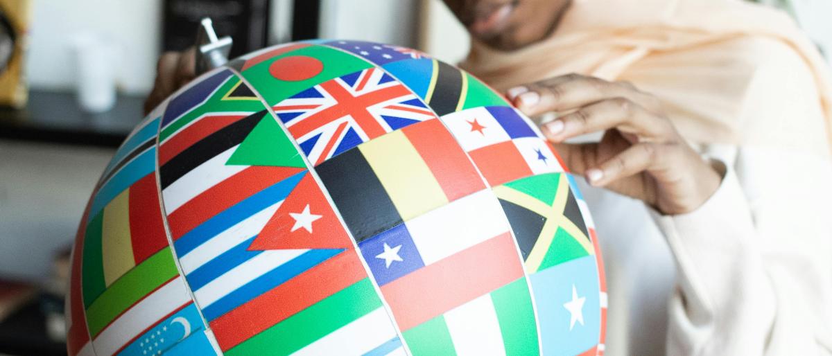 Large globe and person