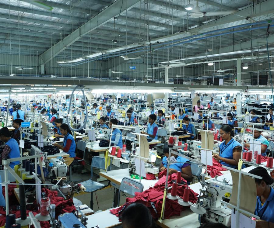 Large room of garment factory workers 