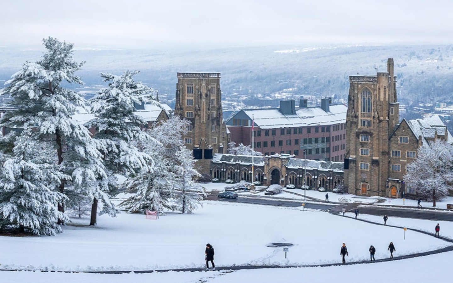 A snowy hilltop view over dorms on Cornell’s West Campus.