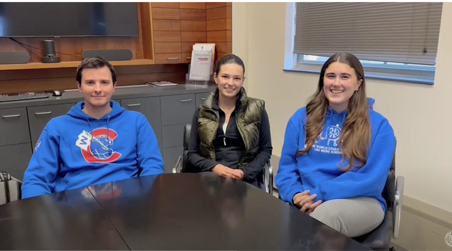 Patrick, Anika and Agnes sitting at a table