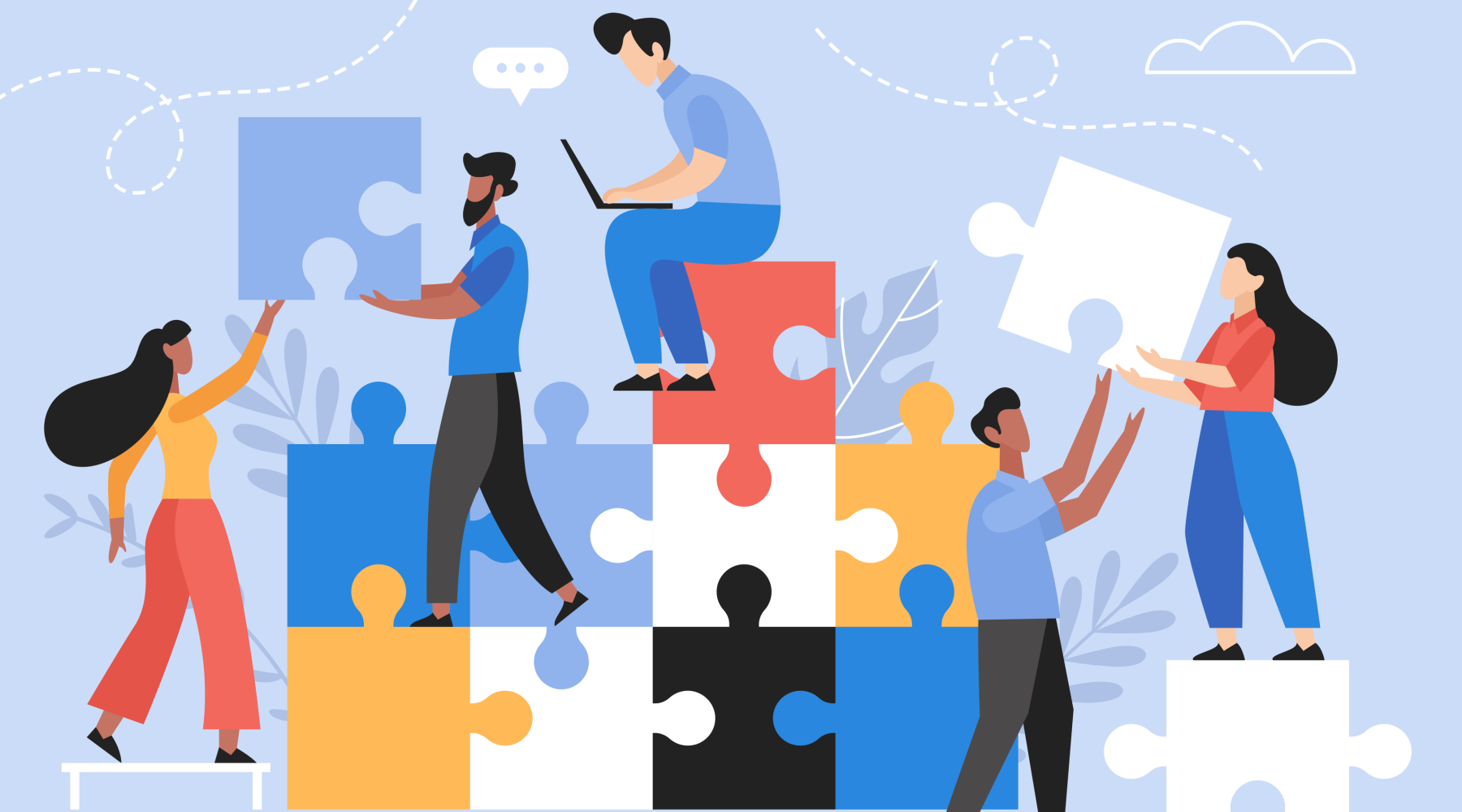 A team of workers assemble puzzle pieces