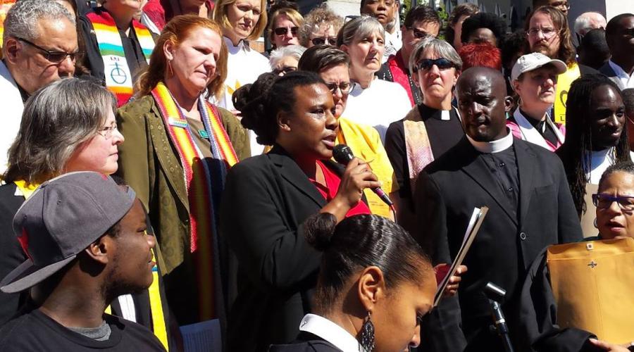 Nia Evans '00 speaking during Moral Monday at the Massachusetts State House in September 2016