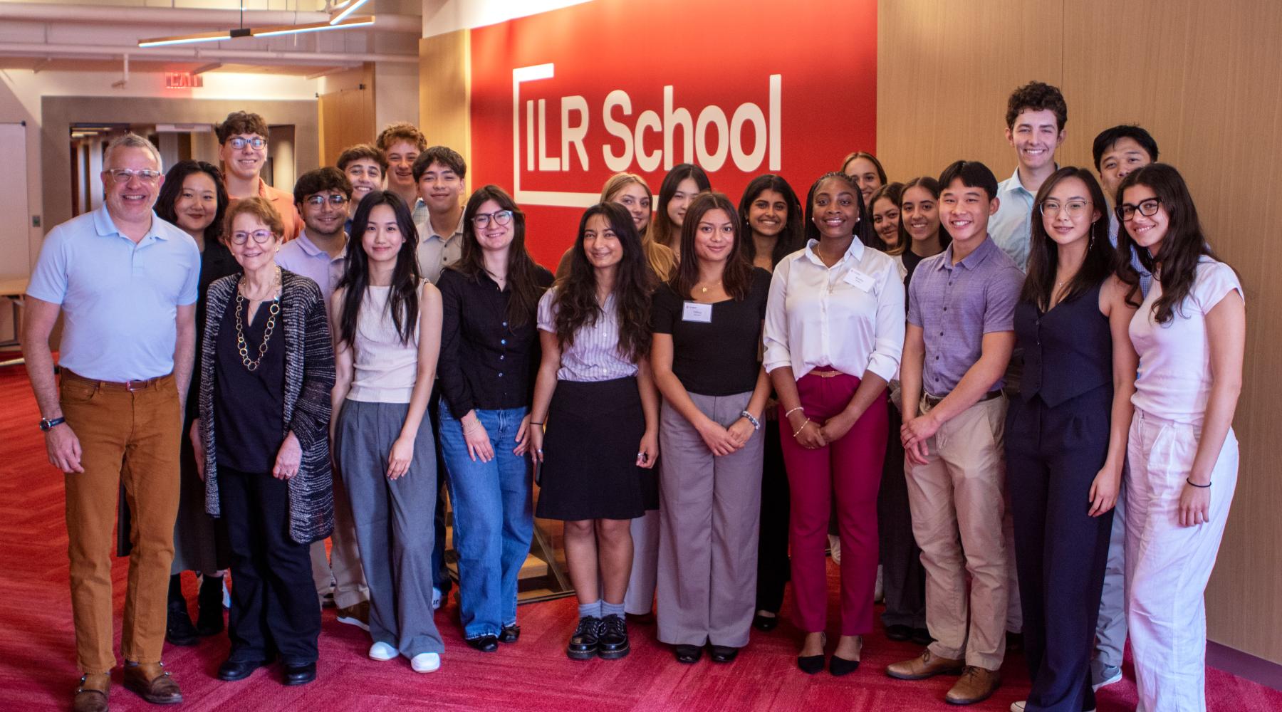 High Road NYC students gather for a photo with invited speaker Adam Klein and program director Esta Bigler.
