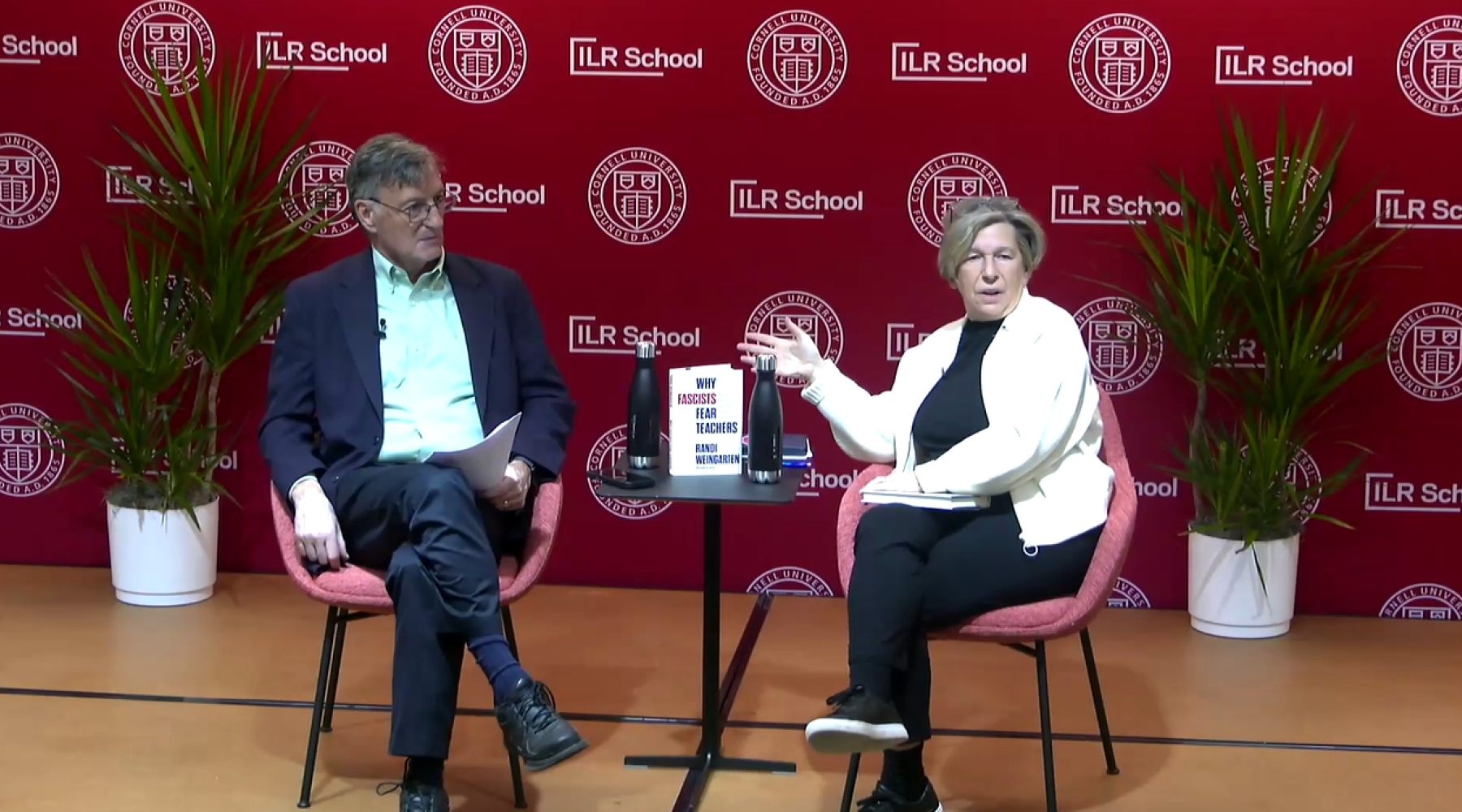 Steven Greenhouse and Randi Weingarten seated on stage