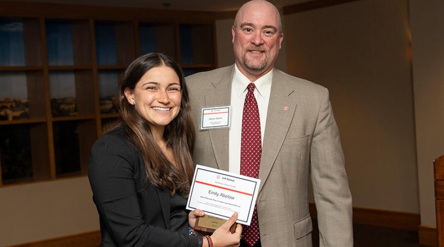 Emily Abelow receives the John O'Donnell Prize in Labor Law from Kevin Harris, the Frank B. Miller Director of ILR Student Services.