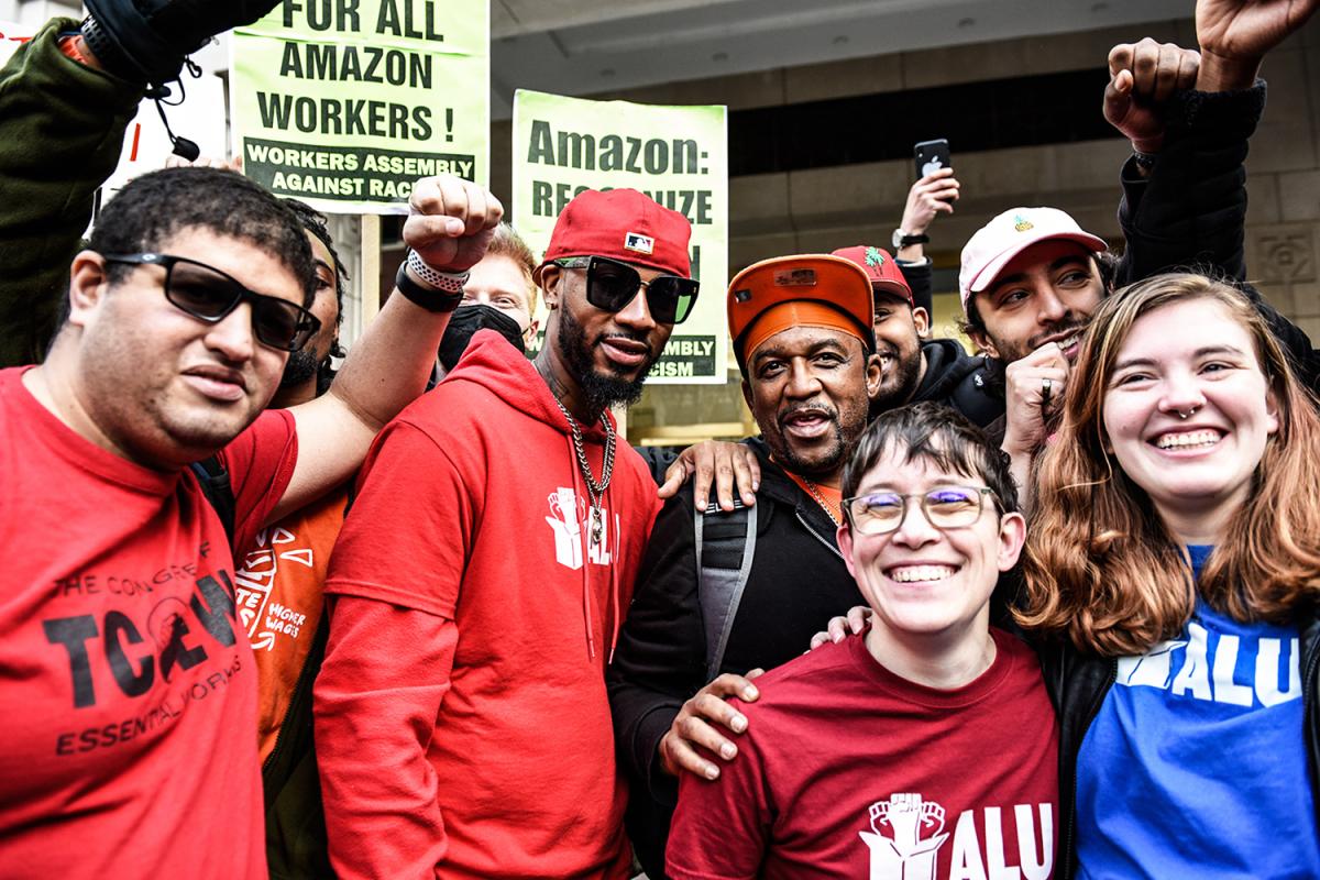 Workers gather together to celebrate the vote's result