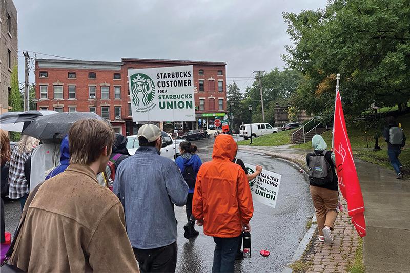 Protesters marching with Starbucks Union signs