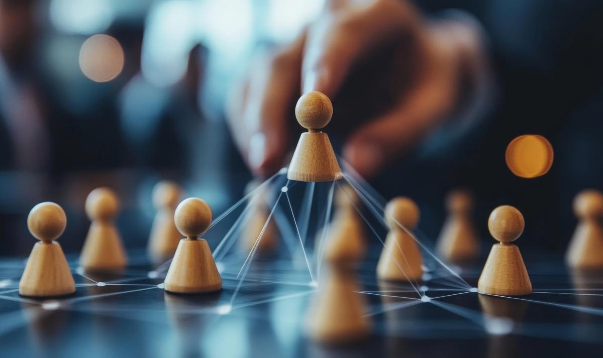 person with little figures representing talent for work