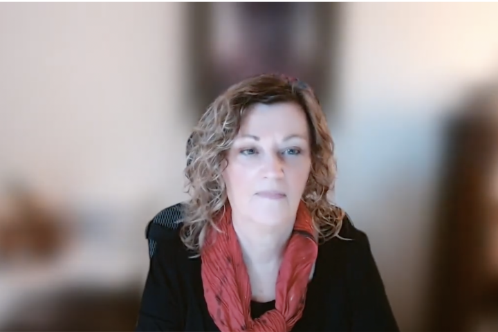 Ellen Gallin Procida sitting down.