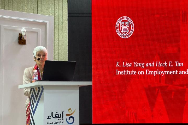 Susanne Bruyère give a presentation in Saudi Arabia.