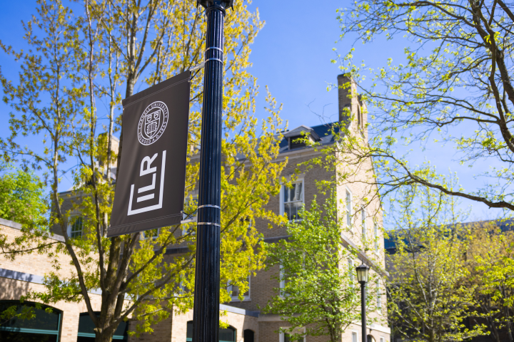 The ILR banner hanging outside Ives Hall
