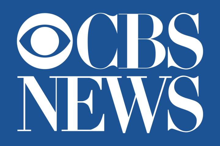 The CBS News logo, where it says CBS in big white text, with News below in, all on a blue background.