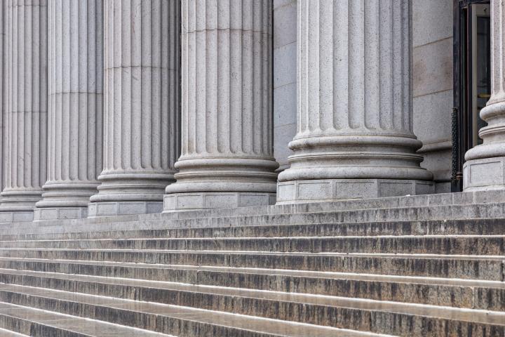 Photo of the base of large columns on a building