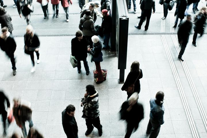 Photo of people milling around building atrium