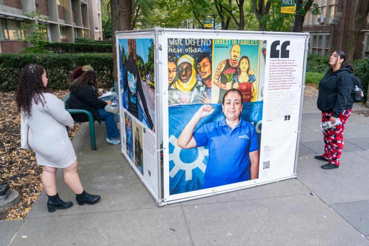 Two people looking at TPS exhibit