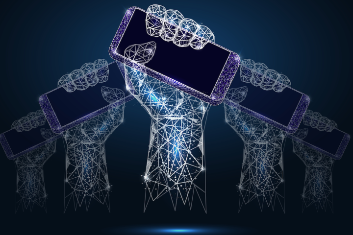 upraised hands grasping smarthphones