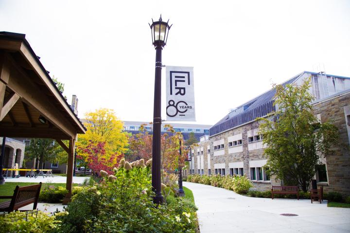 An ILR 80th Anniversary banner hanging in Golden Courtyard