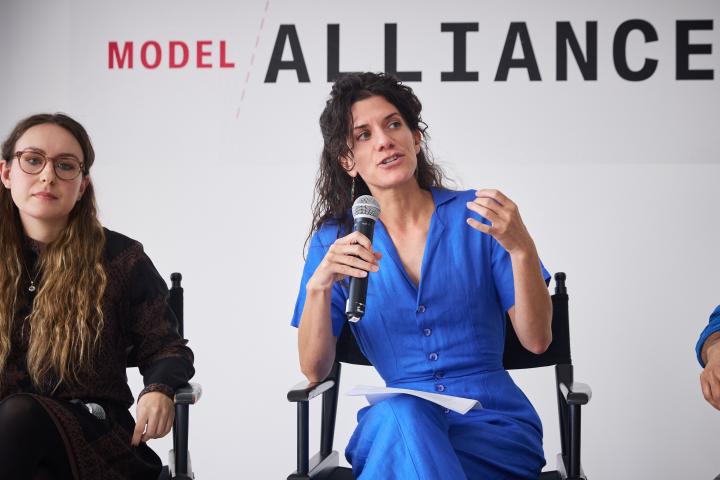 Zoe West speaks at an even during Fashion Week. Photo Credit: Jaka Vinsek and Briana Elledge