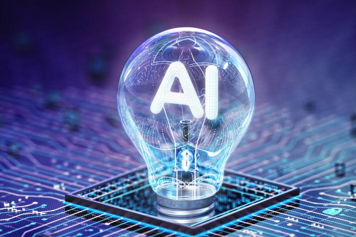 Futuristic looking lightbulb with the letters AI inside, plugged into a circuit board