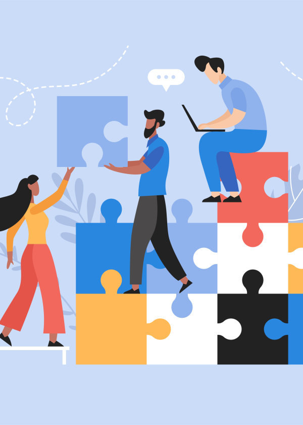 A team of workers assemble puzzle pieces