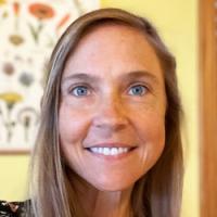 headshot of Gina Oswald